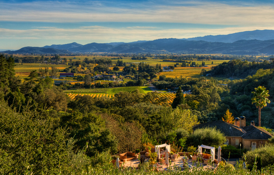 majestic overhead Rutherford view, mountains, grassy hills, vineyards, trees, cloudy sky, Auberge Du Soleil amenities
