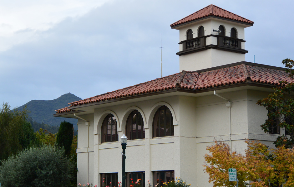 two story San Anselmo Town Hall, Spanish style roof and architecture, third floor watch tower, mount tamalpais, overcast sky
