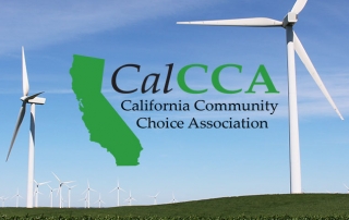 field, lush vegitation, multiple wind turbines, close up and in distance, logo, says California Community Choice Association