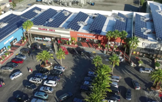 aerial view of Cost Plus Plaza, Larkspur, commercial grade rooftop solar system, full parking lot, decorative palm trees