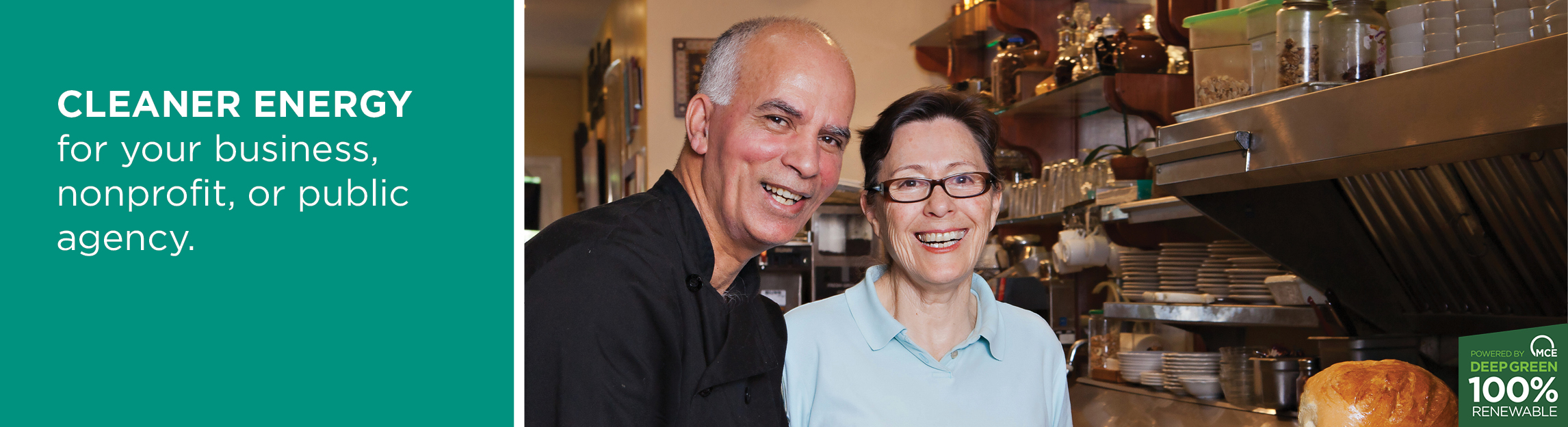 says cleaner energy for your business nonprofit, or public agency, husband and wife business partners in kitchen smiling